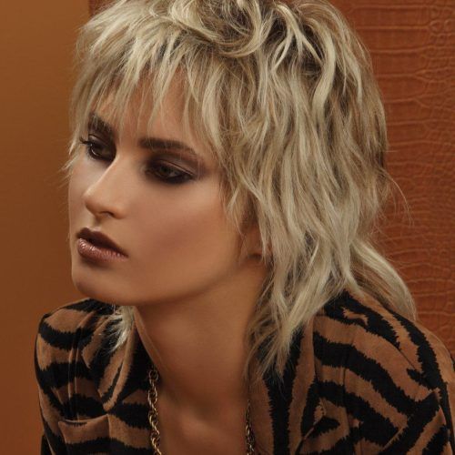 Long Wavy Mullet Hairstyles With Deep Choppy Fringe (Photo 5 of 20)
