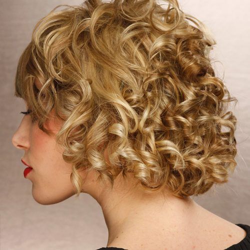 Curly Pixie Hairstyles With Light Blonde Highlights (Photo 17 of 20)