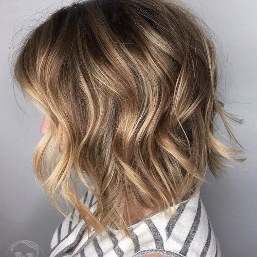 Subtle Dirty Blonde Angled Bob Hairstyles (Photo 6 of 20)