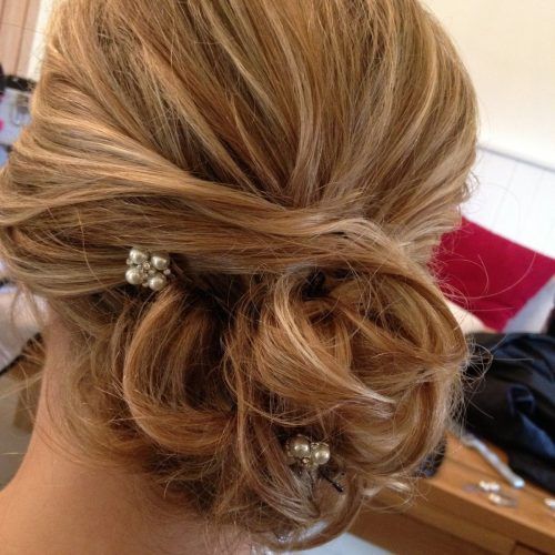 Curly Side Bun Wedding Hairstyles (Photo 1 of 15)