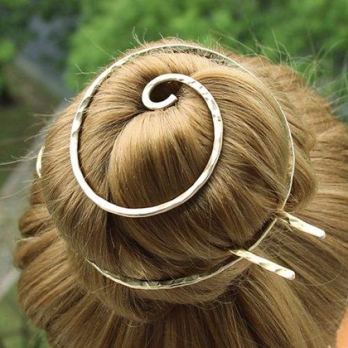 Bun Updo With Accessories For Thick Hair (Photo 8 of 15)