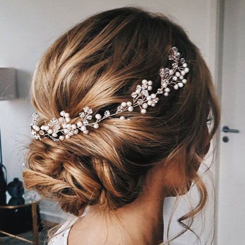 Classic Twists And Waves Bridal Hairstyles (Photo 14 of 20)
