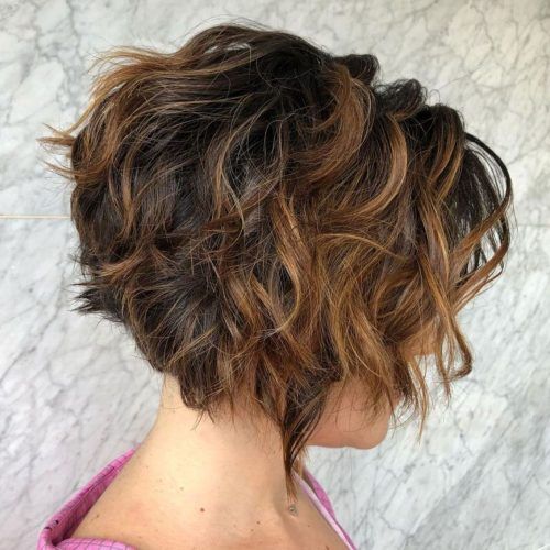 Short Loose Curls Hairstyles With Subtle Ashy Highlights (Photo 4 of 20)