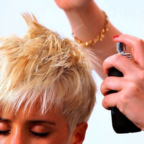 Disheveled Blonde Pixie Haircuts With Elongated Bangs (Photo 15 of 20)