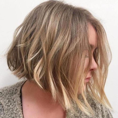 Subtle Dirty Blonde Angled Bob Hairstyles (Photo 1 of 20)