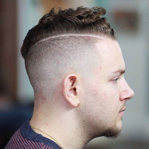 Mohawk Haircuts On Curls With Parting (Photo 16 of 20)
