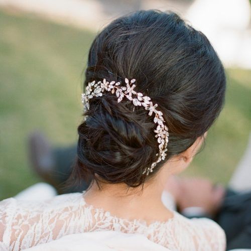 Chignon Wedding Hairstyles With Pinned Up Embellishment (Photo 18 of 20)