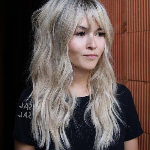 Wispy Layered Blonde Haircuts With Bangs (Photo 9 of 20)