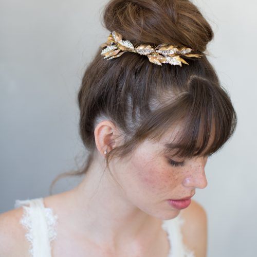 Undone Low Bun Bridal Hairstyles With Floral Headband (Photo 9 of 20)