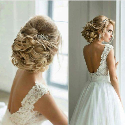 Chignon Wedding Hairstyles With Pinned Up Embellishment (Photo 17 of 20)
