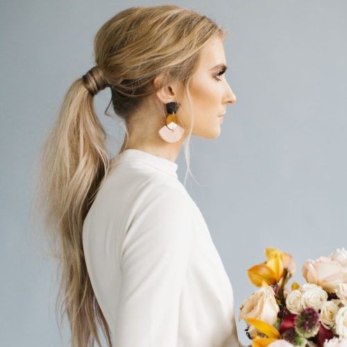 Classy Flower-Studded Pony Hairstyles (Photo 3 of 20)