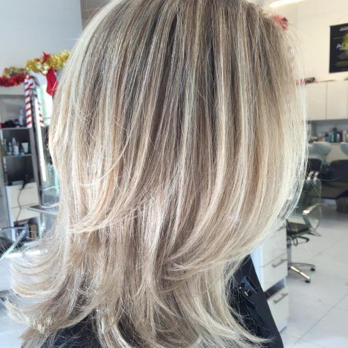 Lovely Golden Blonde Haircuts With Swoopy Layers (Photo 17 of 20)
