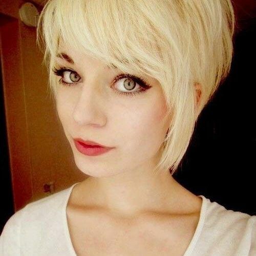 Pixie Haircuts With Long Side Swept Bangs (Photo 1 of 20)