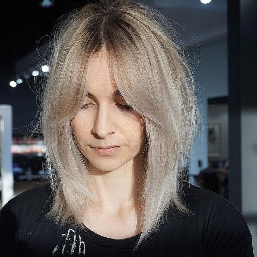 Platinum Tresses Blonde Hairstyles With Shaggy Cut (Photo 9 of 20)