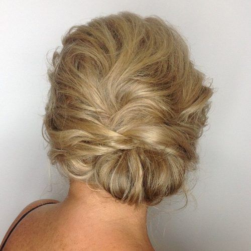 Tousled Asymmetrical Updo Wedding Hairstyles (Photo 1 of 20)