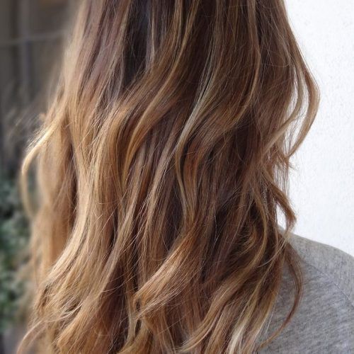 Long Waves Hairstyles With Subtle Highlights (Photo 16 of 20)