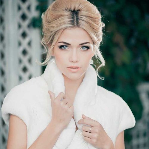 Bridal Mid-Bun Hairstyles With A Bouffant (Photo 1 of 20)