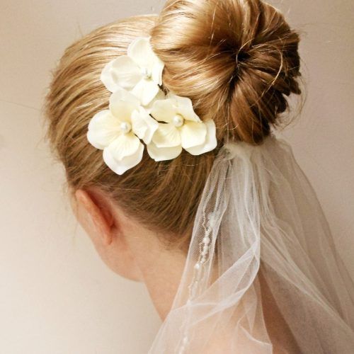 Updo Hairstyles With Flowers (Photo 15 of 15)