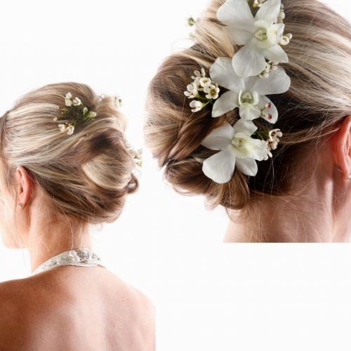 Updo Hairstyles With Flowers (Photo 13 of 15)