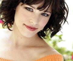 2024 Popular Curly Medium Hairstyles with Bangs