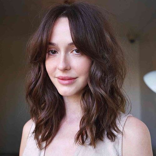 Loose Waves With Unshowy Curtain Bangs (Photo 7 of 15)