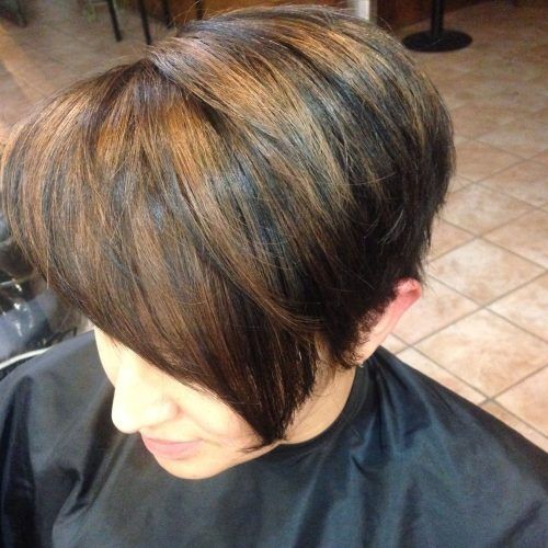 Short Side Swept Pixie Haircuts With Caramel Highlights (Photo 14 of 20)