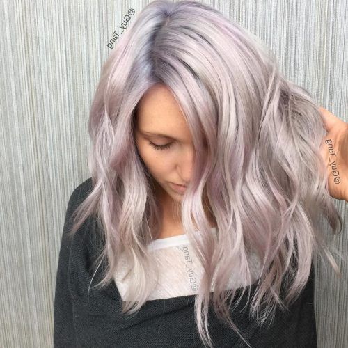 Voluminous Platinum And Purple Curls Blonde Hairstyles (Photo 13 of 20)