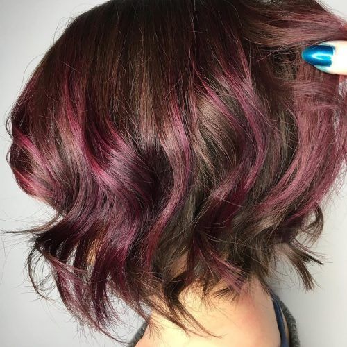 Voluminous Platinum And Purple Curls Blonde Hairstyles (Photo 20 of 20)