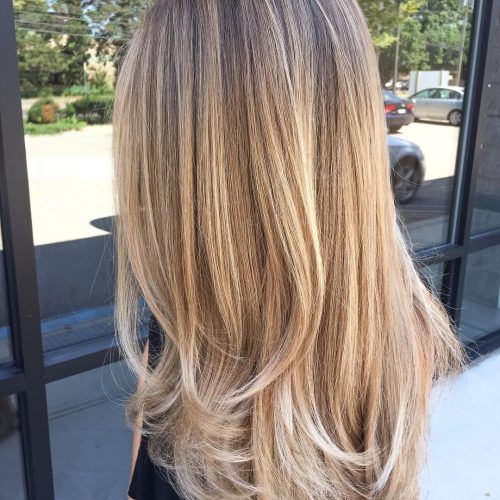 Lovely Golden Blonde Haircuts With Swoopy Layers (Photo 4 of 20)