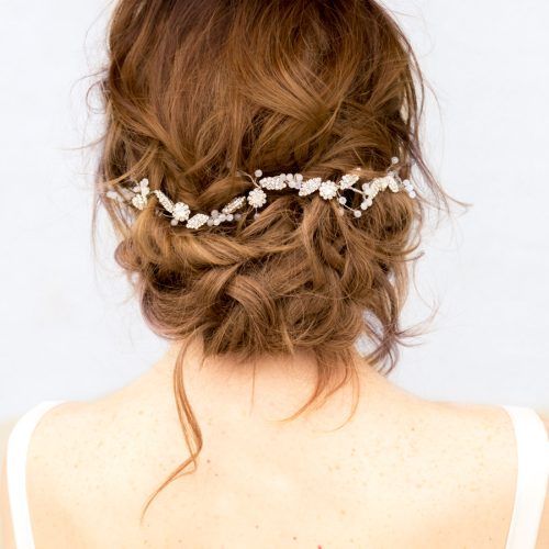 Side Bun Prom Hairstyles With Orchids (Photo 19 of 20)