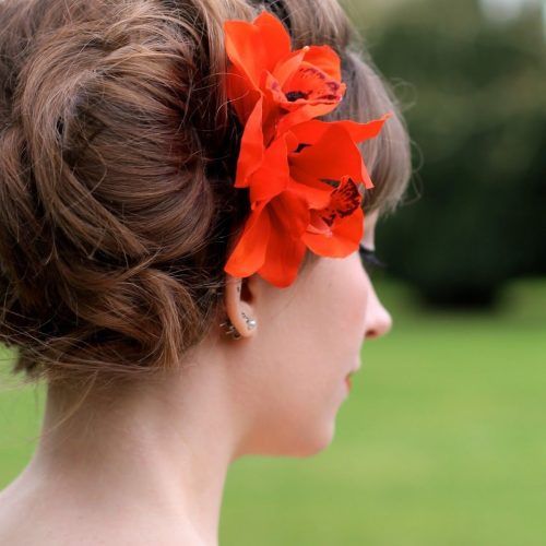 Side Bun Prom Hairstyles With Orchids (Photo 2 of 20)