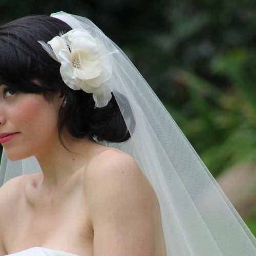Wedding Hairstyles With Veil And Flower (Photo 6 of 15)