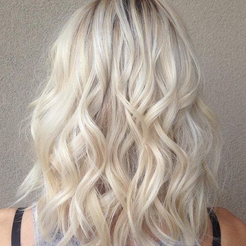 Casual Bright Waves Blonde Hairstyles With Bangs (Photo 19 of 20)
