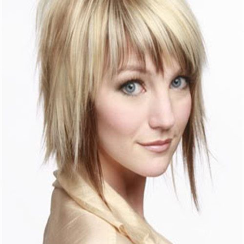 Long Wavy Mullet Hairstyles With Deep Choppy Fringe (Photo 12 of 20)