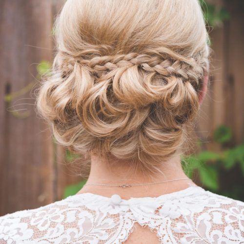 Side Bun Prom Hairstyles With Black Feathers (Photo 17 of 20)