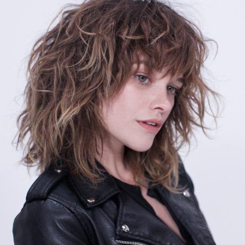 Textured Shag Haircuts With Rocky Bangs (Photo 20 of 20)