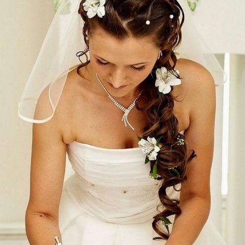 Wedding Hairstyles For Long Hair Down With Flowers (Photo 15 of 15)